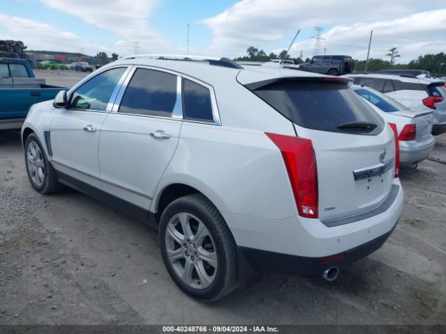 Photo 2 VIN: 3GYFNDE32GS584534 - CADILLAC SRX 