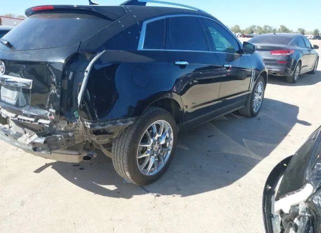 Photo 3 VIN: 3GYFNDE33ES568095 - CADILLAC SRX 