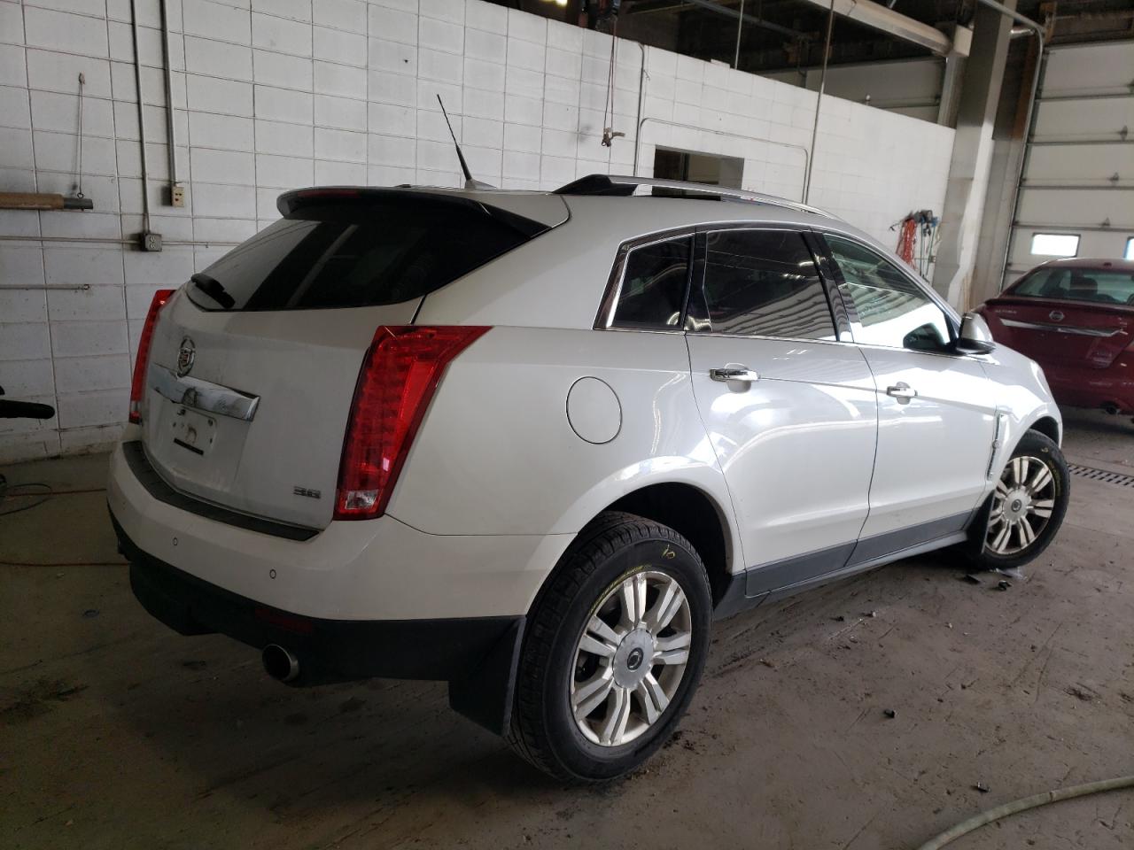 Photo 2 VIN: 3GYFNDE34CS570211 - CADILLAC SRX 