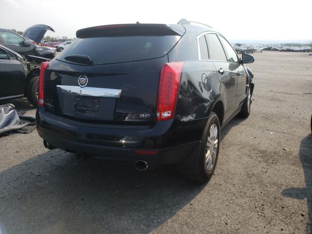 Photo 3 VIN: 3GYFNDE34CS659115 - CADILLAC SRX LUXURY 