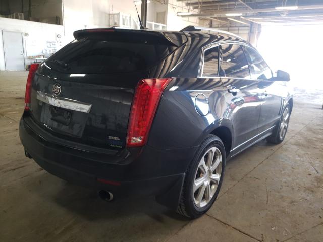 Photo 3 VIN: 3GYFNDE34DS520460 - CADILLAC SRX PERFOR 