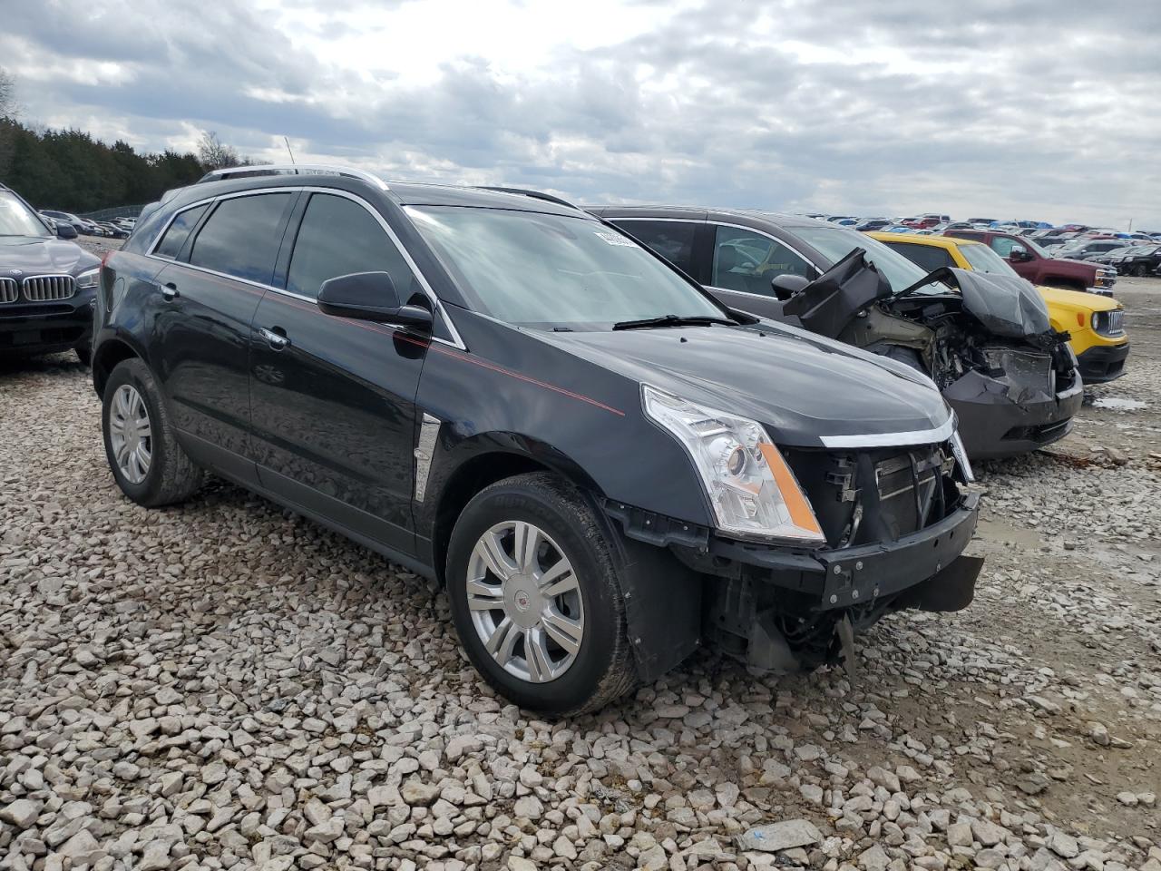 Photo 3 VIN: 3GYFNDE35CS518571 - CADILLAC SRX 