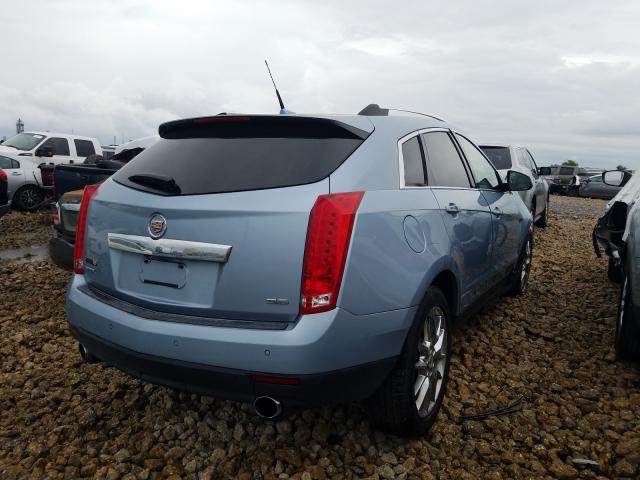 Photo 3 VIN: 3GYFNDE36DS576111 - CADILLAC SRX PERFOR 