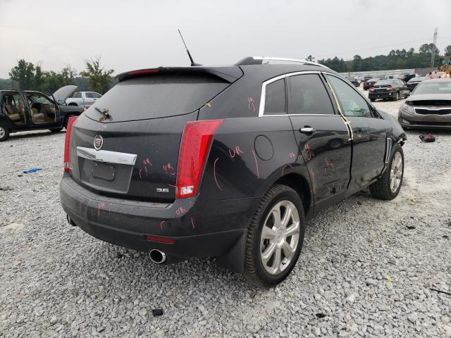 Photo 3 VIN: 3GYFNDE37DS531582 - CADILLAC SRX PERFOR 