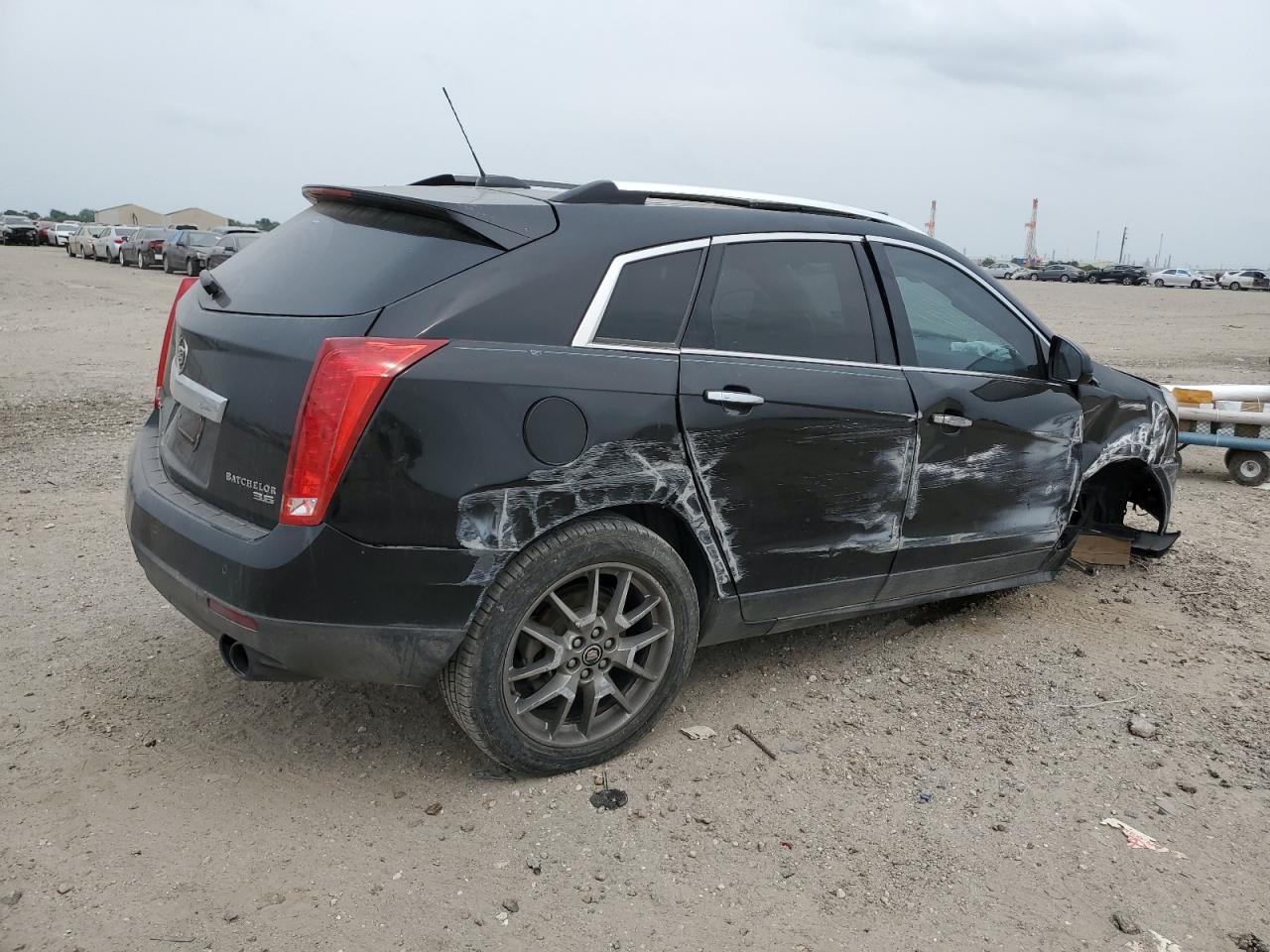 Photo 2 VIN: 3GYFNDE37GS563288 - CADILLAC SRX 