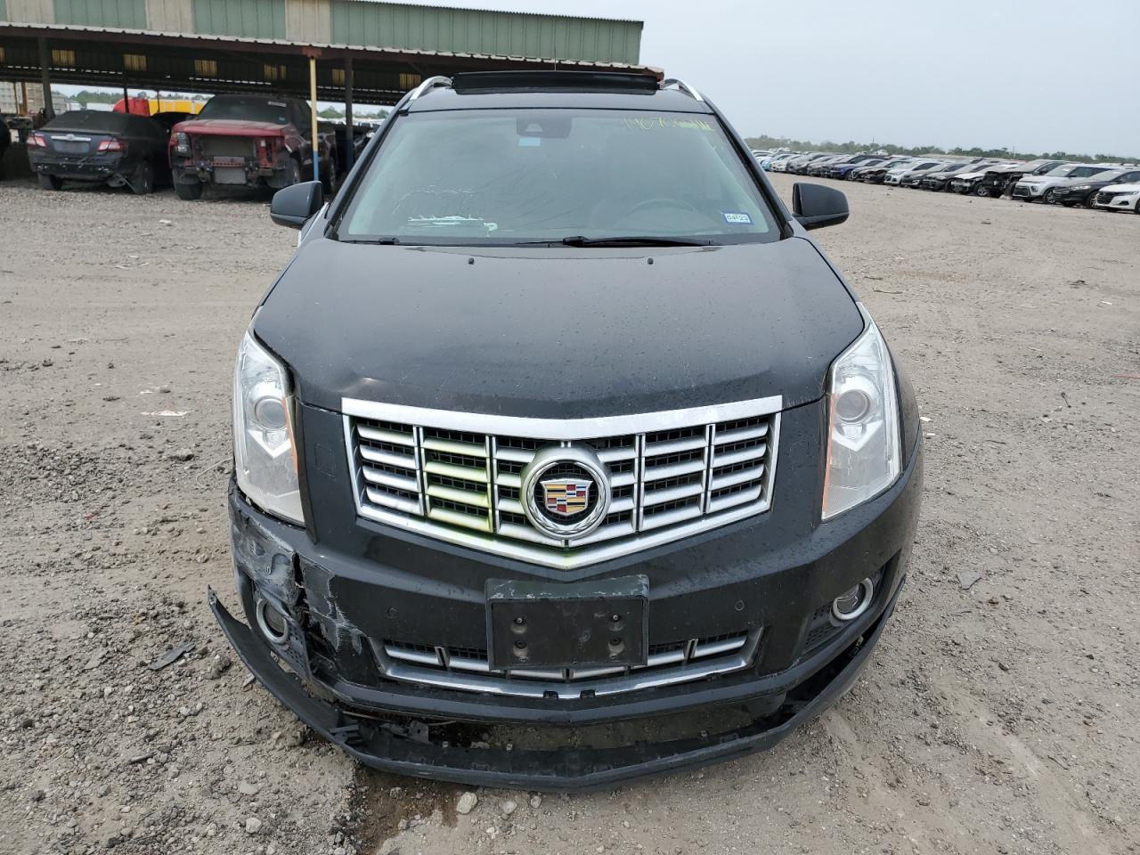 Photo 4 VIN: 3GYFNDE37GS563288 - CADILLAC SRX 