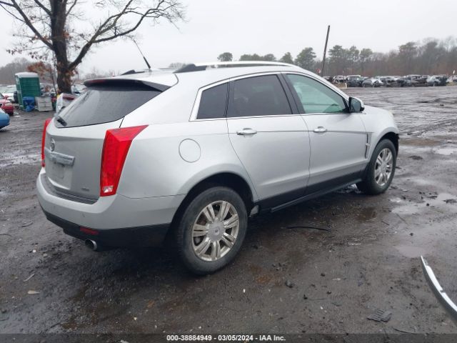 Photo 3 VIN: 3GYFNDE38CS504681 - CADILLAC SRX 