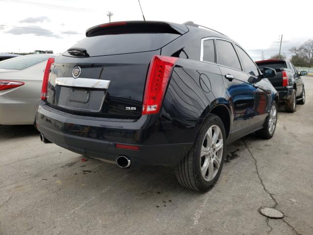 Photo 3 VIN: 3GYFNDE38DS566132 - CADILLAC SRX PERFOR 