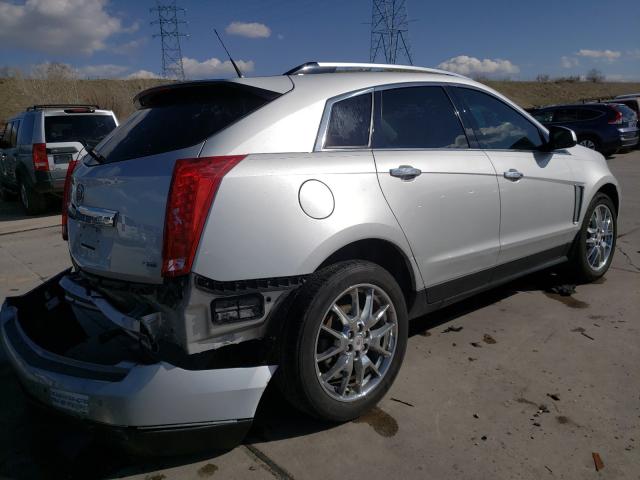 Photo 3 VIN: 3GYFNDE38DS637605 - CADILLAC SRX PERFOR 