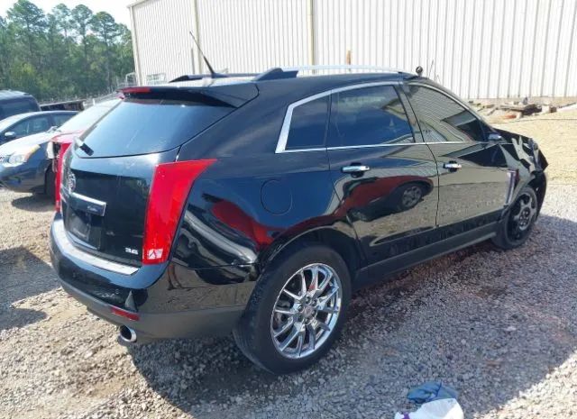 Photo 3 VIN: 3GYFNDE38ES519135 - CADILLAC SRX 