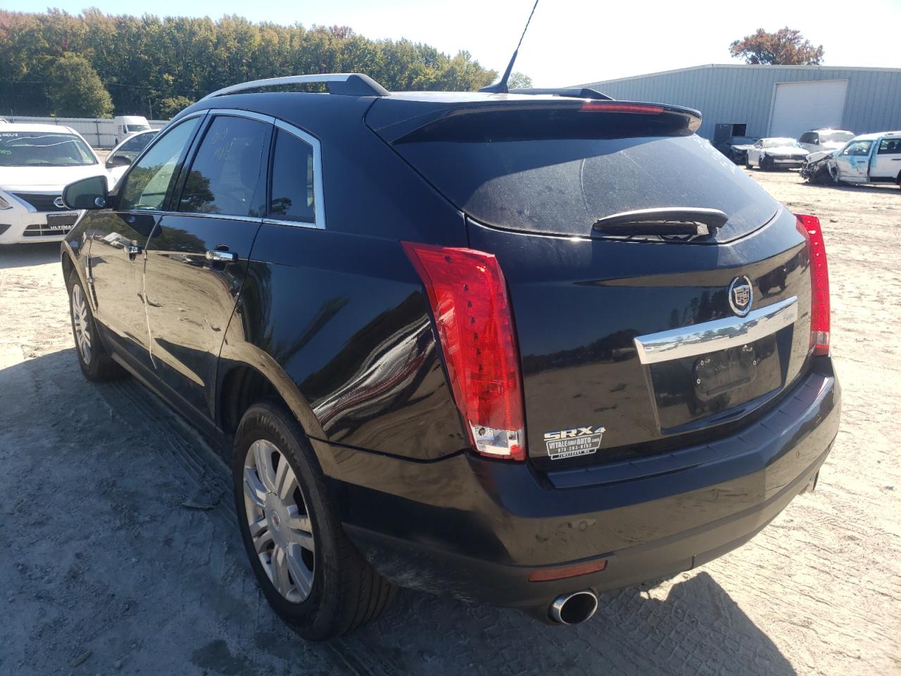 Photo 2 VIN: 3GYFNDE39CS557468 - CADILLAC SRX 