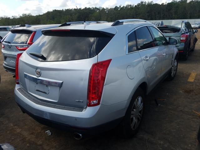 Photo 3 VIN: 3GYFNDE3XCS599762 - CADILLAC SRX LUXURY 