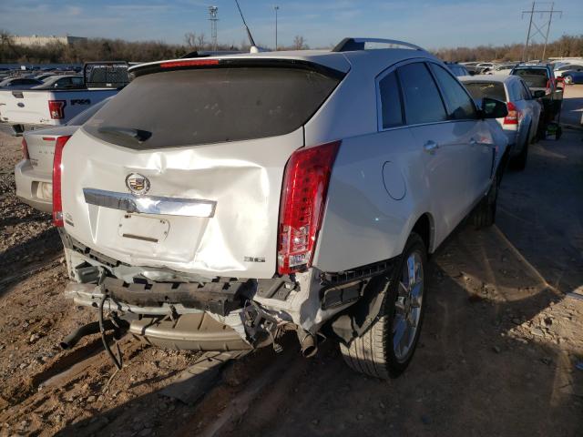 Photo 3 VIN: 3GYFNDE3XDS543144 - CADILLAC SRX PERFOR 