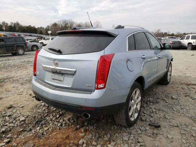 Photo 3 VIN: 3GYFNDE3XDS561580 - CADILLAC SRX PERFOR 