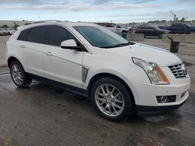 Photo 3 VIN: 3GYFNDE3XES624551 - CADILLAC SRX PREMIU 