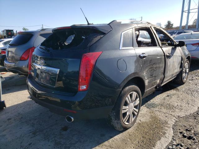 Photo 3 VIN: 3GYFNDEY7BS667932 - CADILLAC SRX LUXURY 