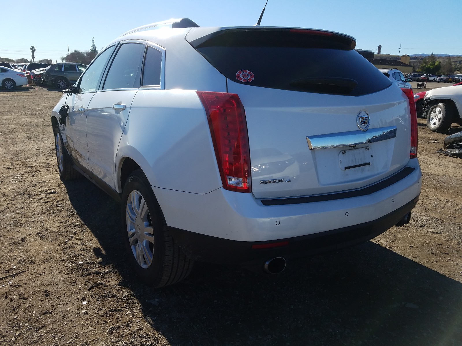 Photo 2 VIN: 3GYFNDEYXAS655143 - CADILLAC SRX LUXURY 