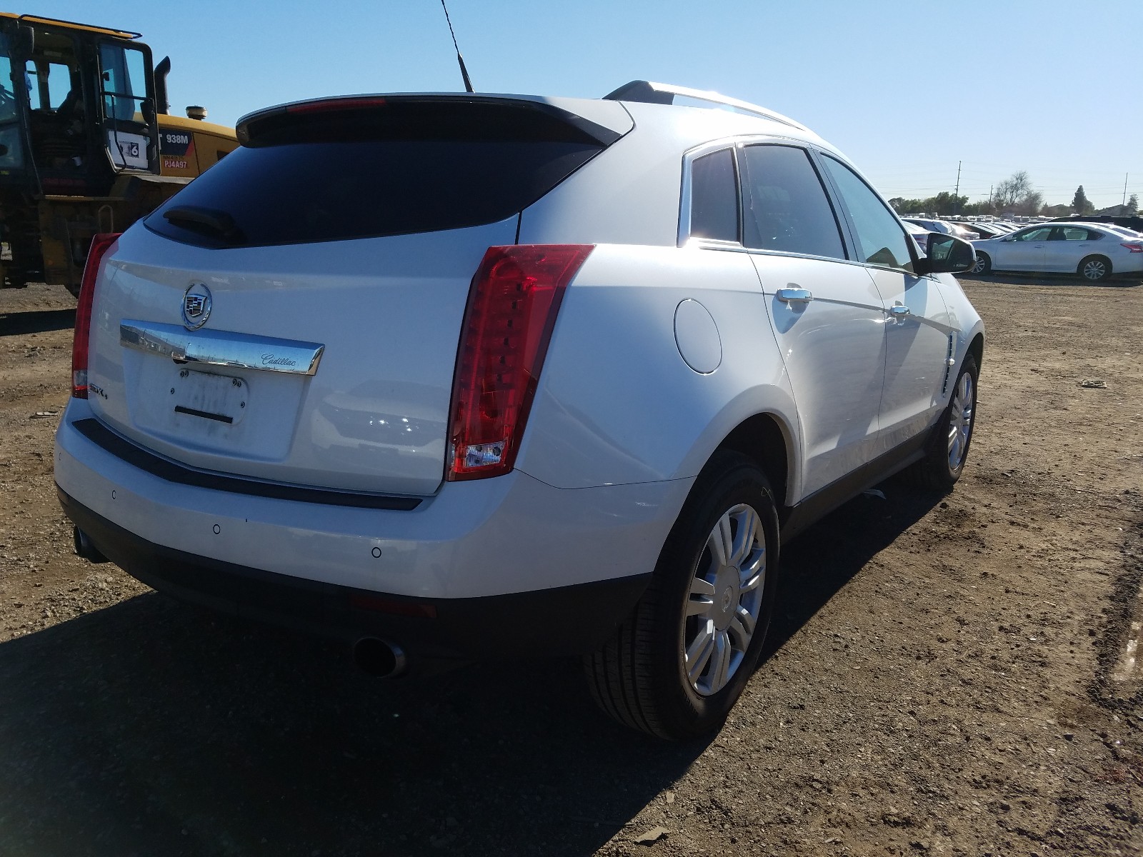 Photo 3 VIN: 3GYFNDEYXAS655143 - CADILLAC SRX LUXURY 