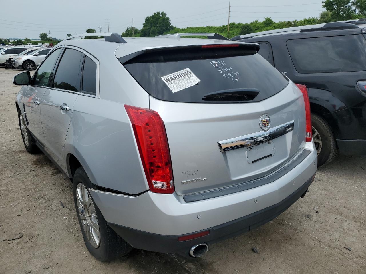 Photo 1 VIN: 3GYFNDEYXBS534100 - CADILLAC SRX 