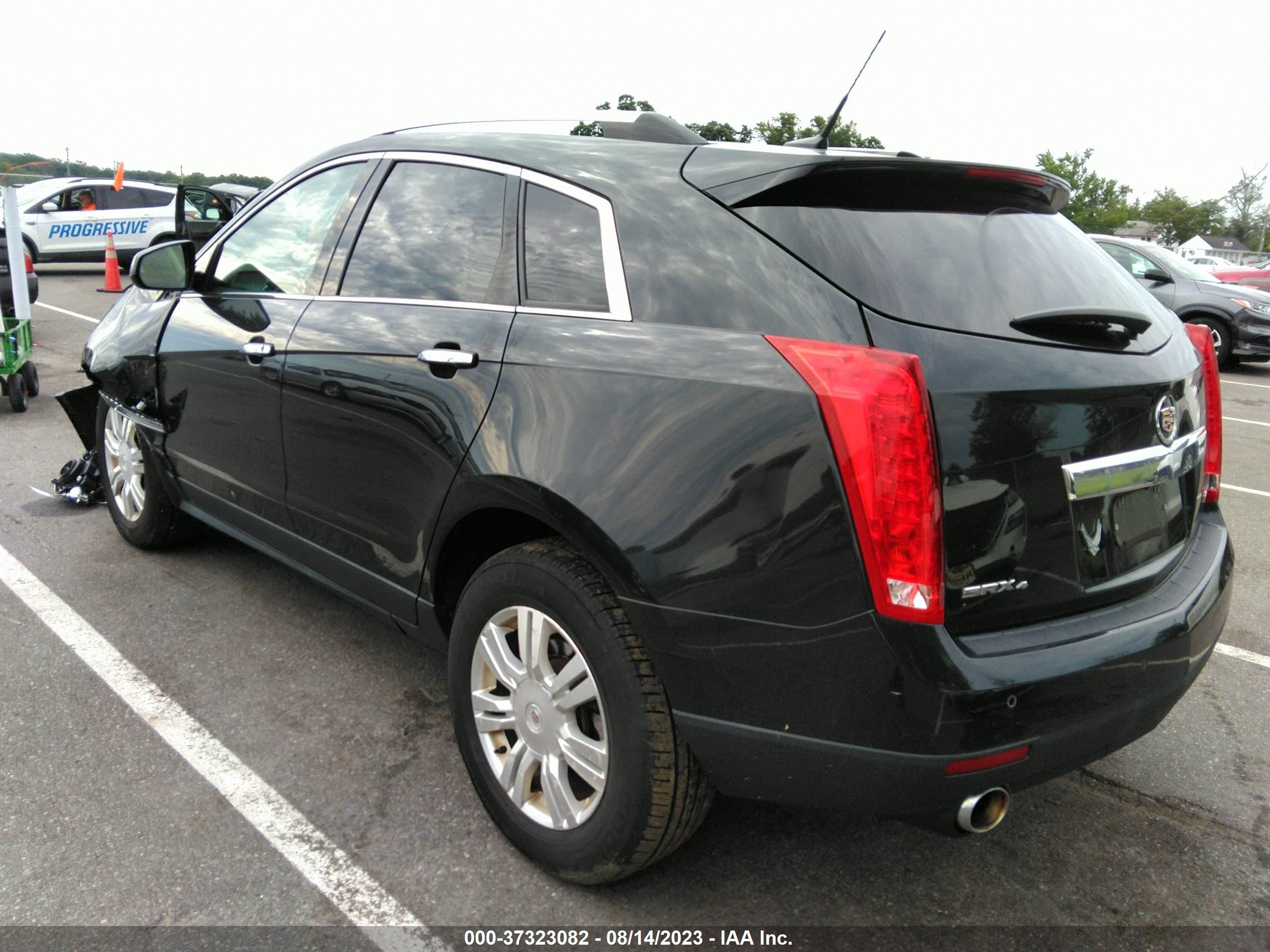 Photo 2 VIN: 3GYFNEE30ES559523 - CADILLAC SRX 