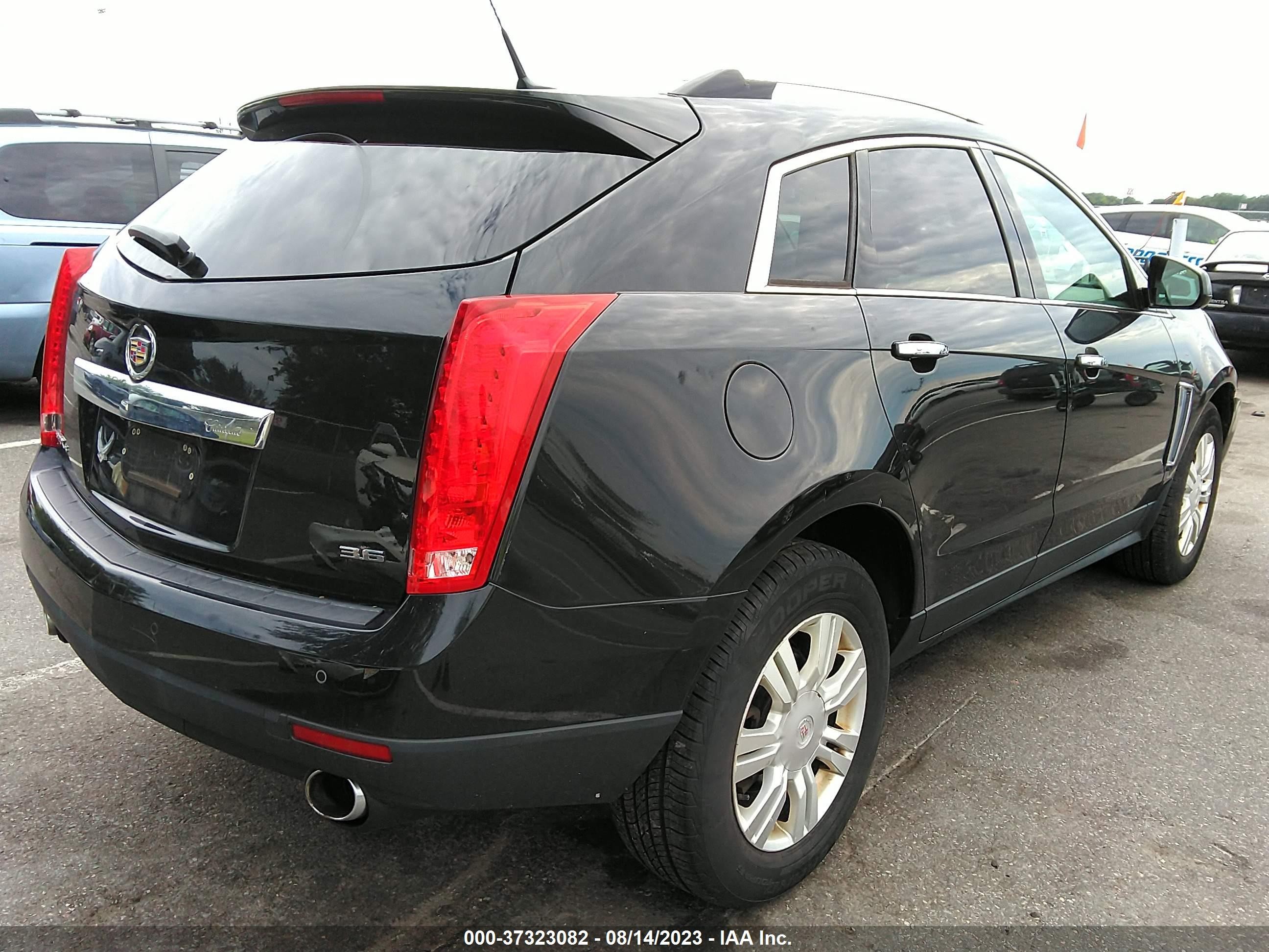 Photo 3 VIN: 3GYFNEE30ES559523 - CADILLAC SRX 