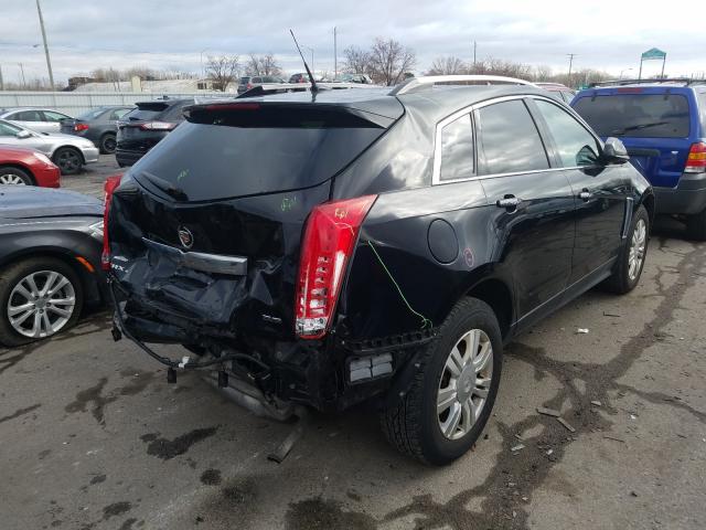 Photo 3 VIN: 3GYFNEE31ES579909 - CADILLAC SRX LUXURY 