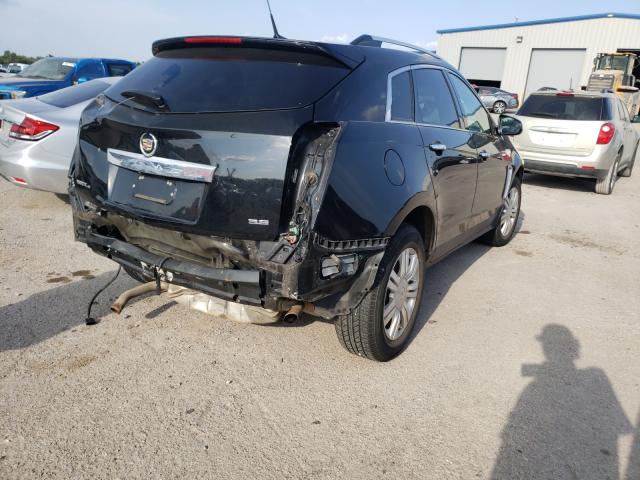 Photo 3 VIN: 3GYFNEE31ES687821 - CADILLAC SRX LUXURY 