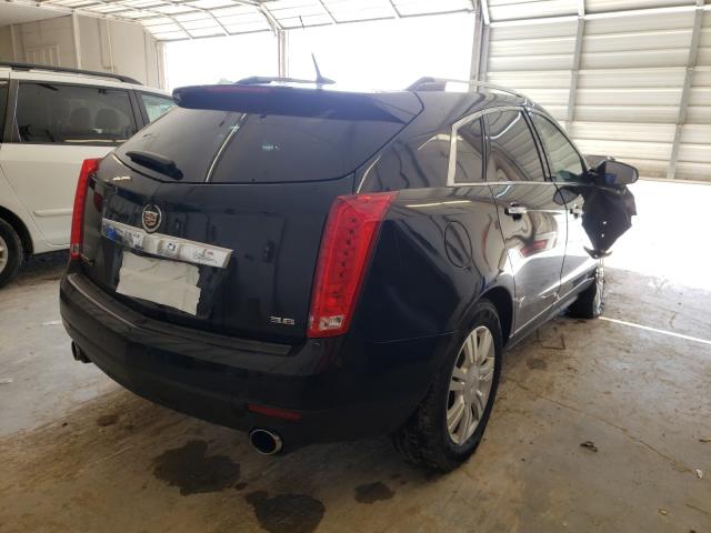 Photo 3 VIN: 3GYFNEE32ES519749 - CADILLAC SRX 