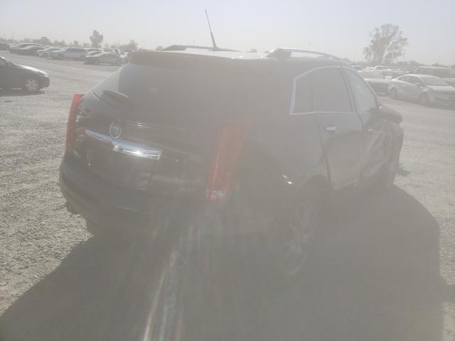 Photo 3 VIN: 3GYFNEE32ES576243 - CADILLAC SRX 