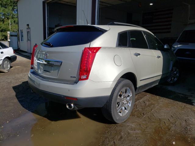 Photo 3 VIN: 3GYFNEE32ES582530 - CADILLAC SRX LUXURY 