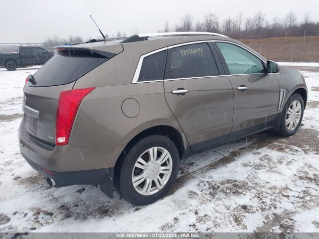 Photo 3 VIN: 3GYFNEE33ES569219 - CADILLAC SRX 