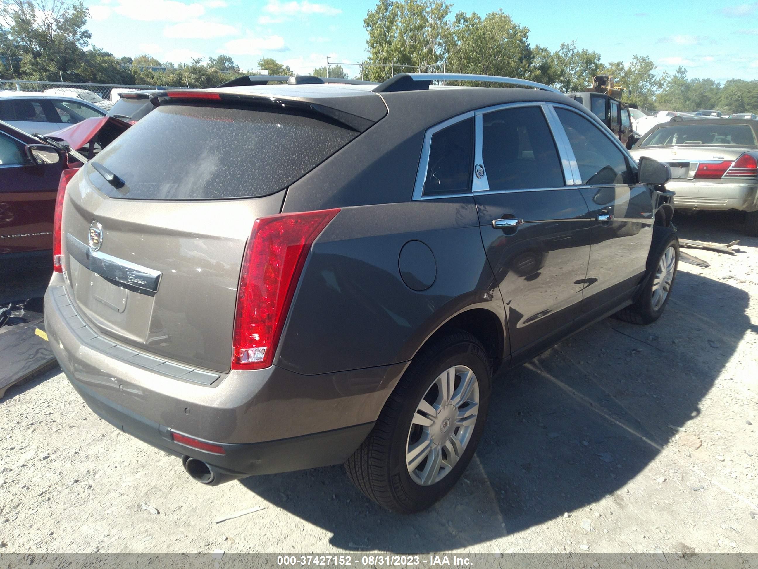 Photo 3 VIN: 3GYFNEE33FS541373 - CADILLAC SRX 