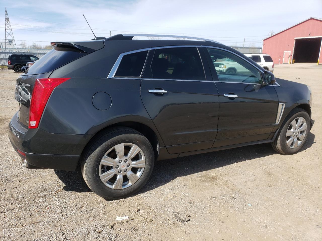 Photo 2 VIN: 3GYFNEE33FS595949 - CADILLAC SRX 