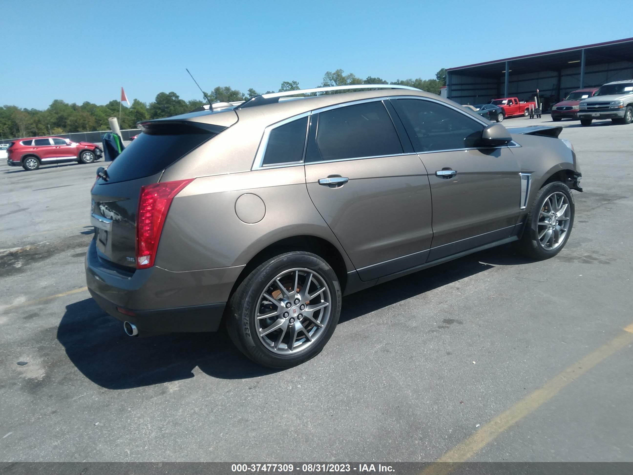 Photo 3 VIN: 3GYFNEE33GS530133 - CADILLAC SRX 