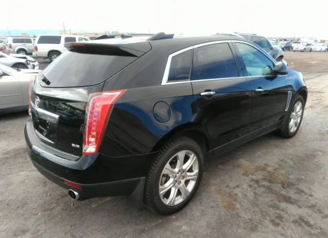 Photo 3 VIN: 3GYFNEE34DS628132 - CADILLAC SRX 