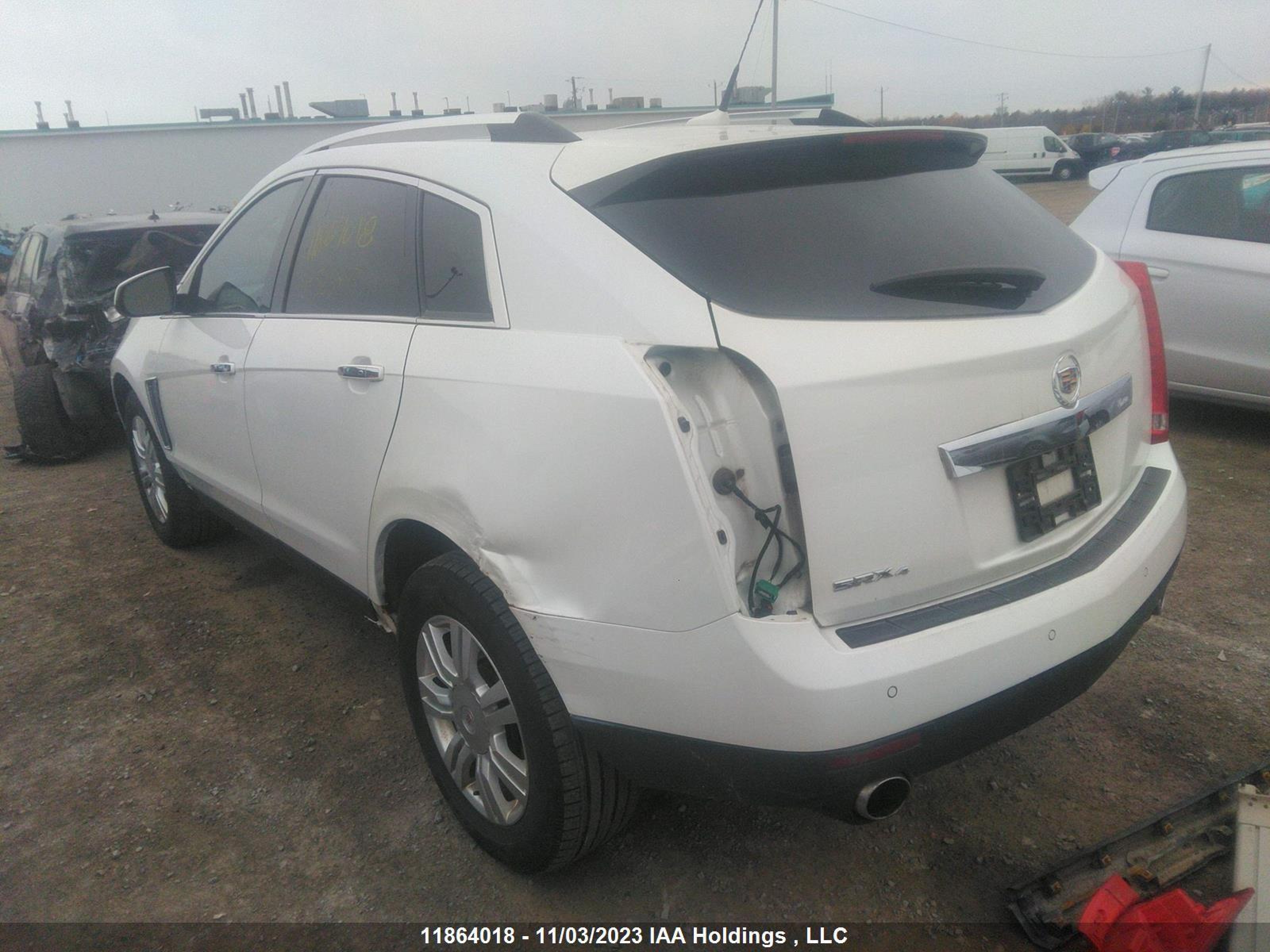 Photo 2 VIN: 3GYFNEE34ES523897 - CADILLAC SRX 