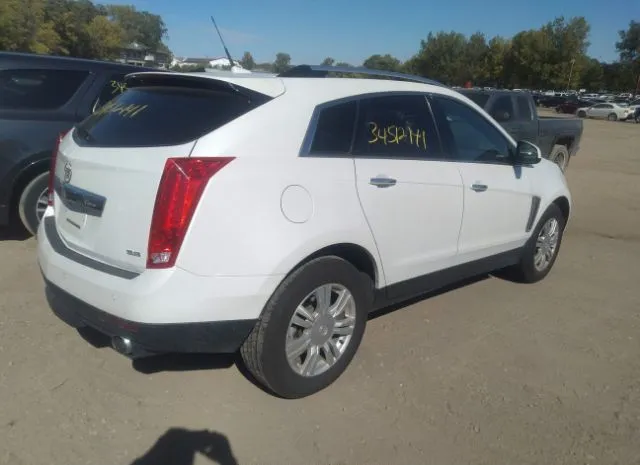 Photo 3 VIN: 3GYFNEE34ES628570 - CADILLAC SRX 