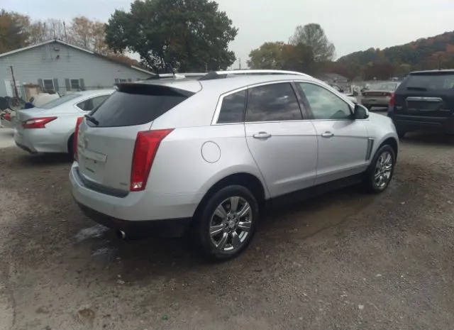 Photo 3 VIN: 3GYFNEE37ES528589 - CADILLAC SRX 