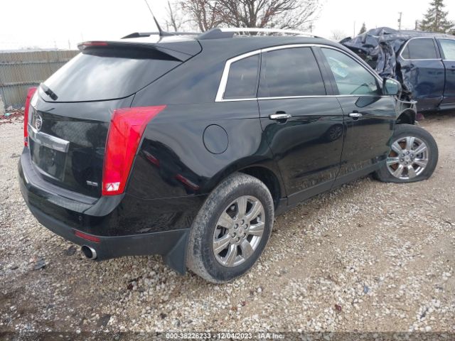 Photo 3 VIN: 3GYFNEE39ES659054 - CADILLAC SRX 