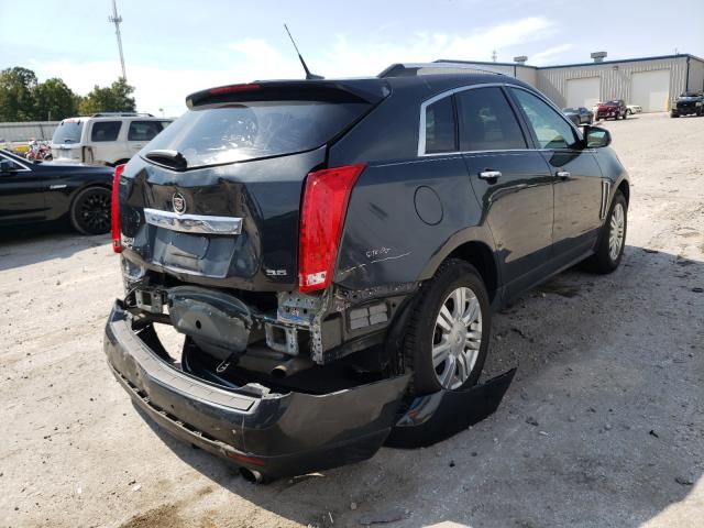 Photo 3 VIN: 3GYFNEE39ES668272 - CADILLAC SRX LUXURY 