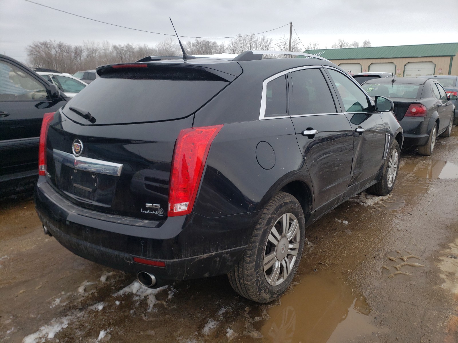 Photo 3 VIN: 3GYFNEE3XES521667 - CADILLAC SRX LUXURY 