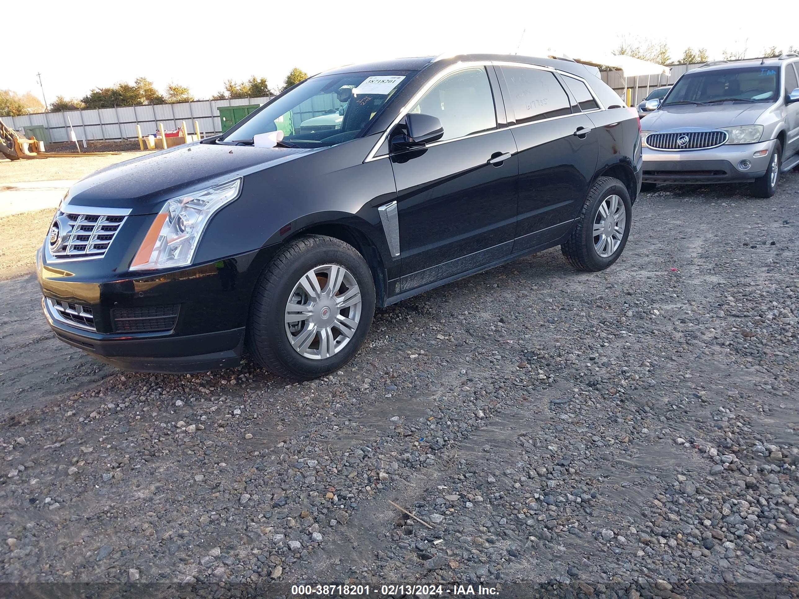 Photo 1 VIN: 3GYFNEE3XES617735 - CADILLAC SRX 