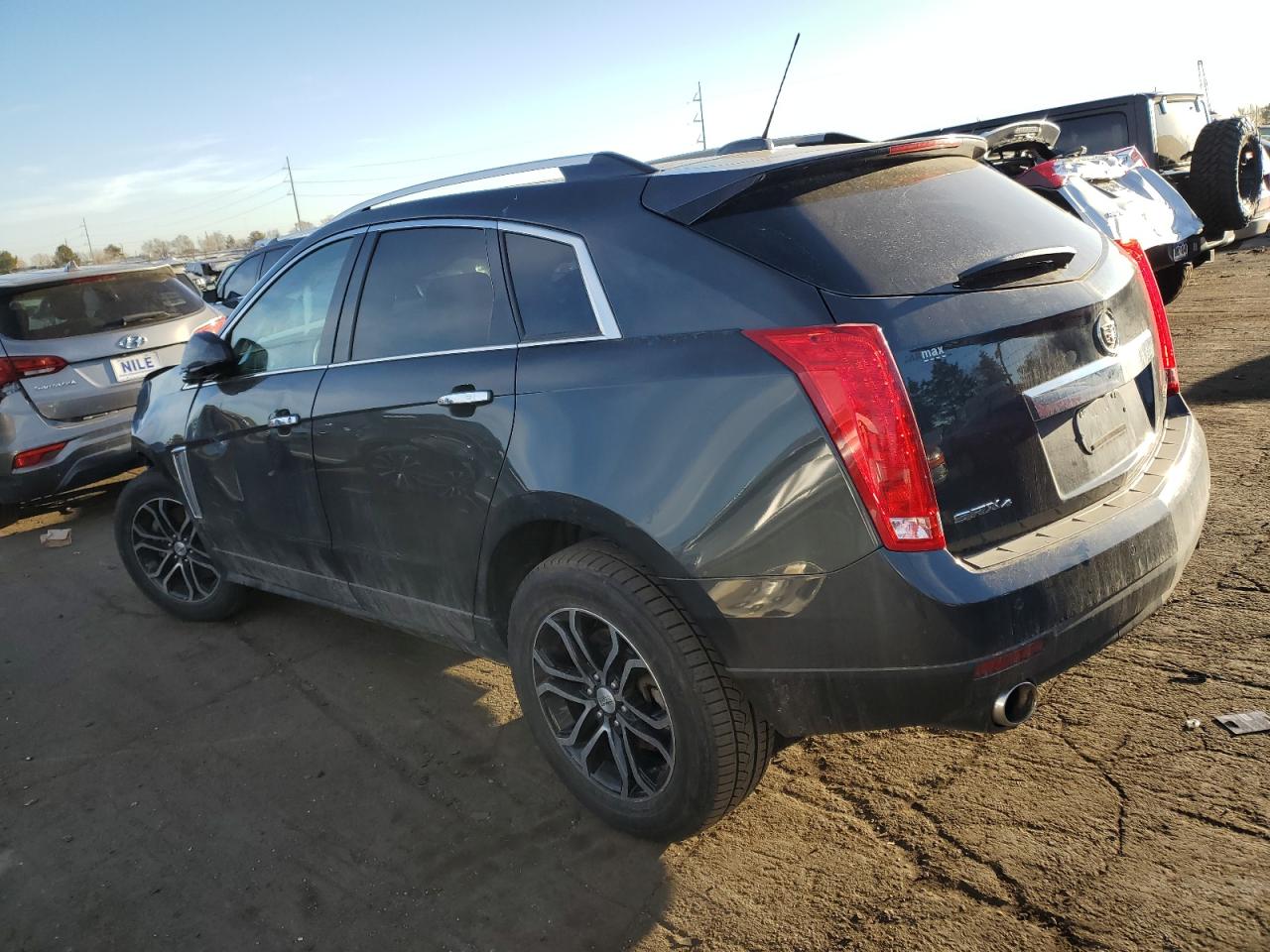 Photo 1 VIN: 3GYFNEE3XGS529853 - CADILLAC SRX 