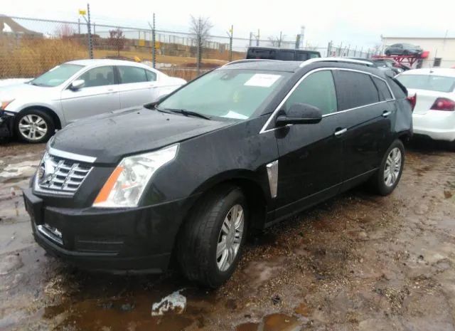 Photo 1 VIN: 3GYFNEE3XGS587705 - CADILLAC SRX 