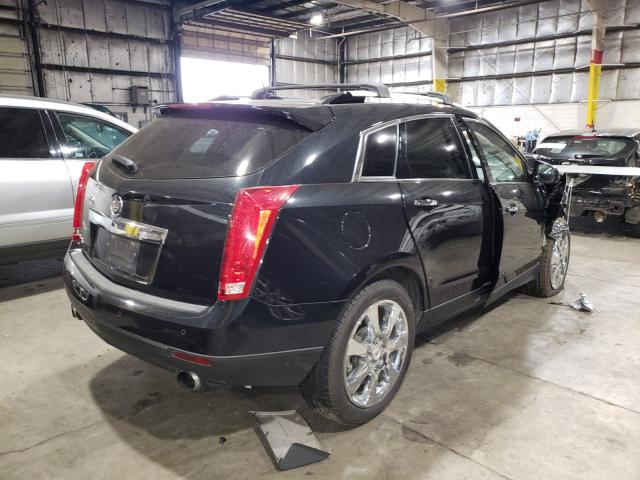 Photo 3 VIN: 3GYFNEEYXBS545961 - CADILLAC SRX PERFOR 