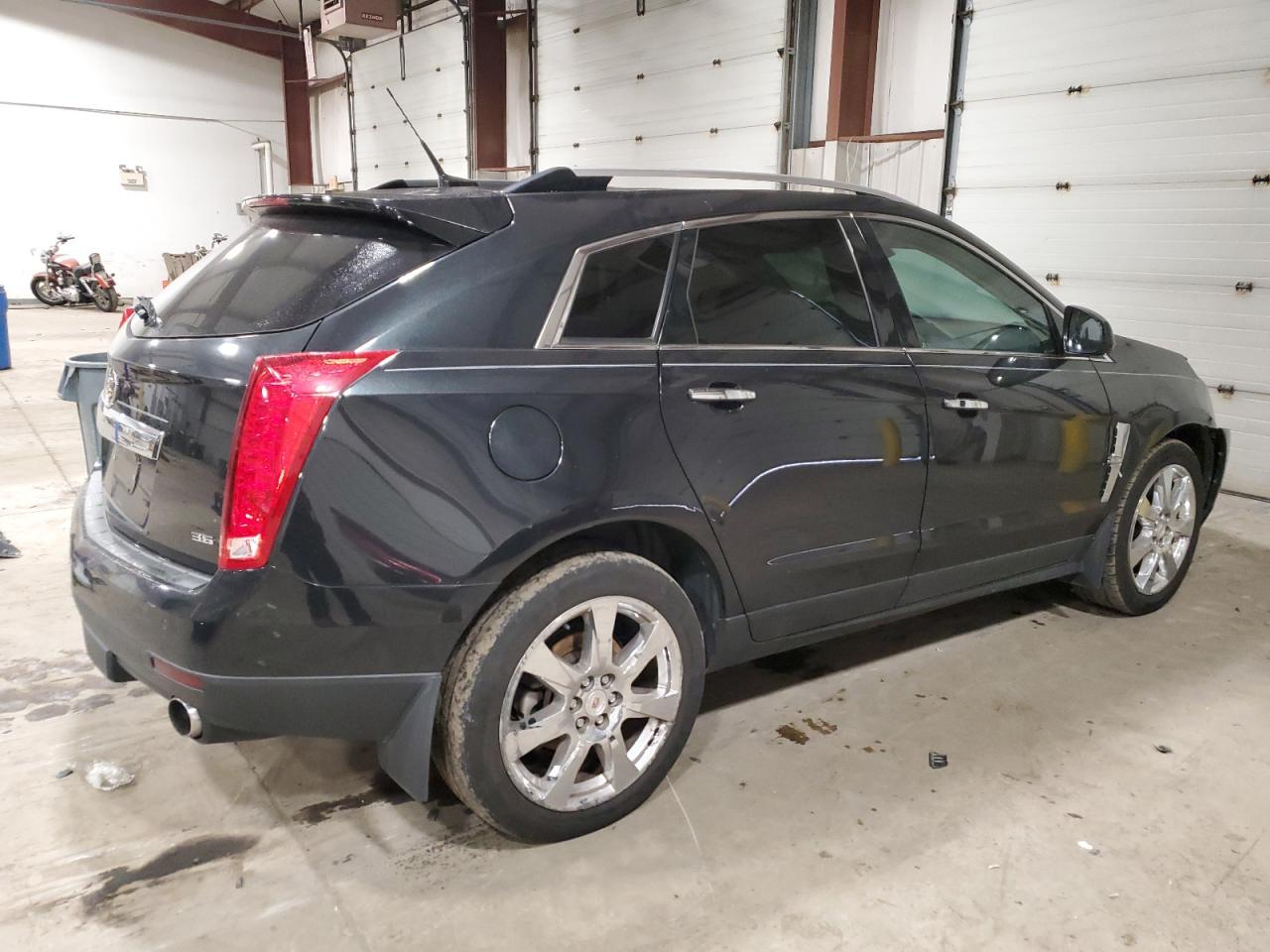 Photo 2 VIN: 3GYFNFE30CS565521 - CADILLAC SRX 