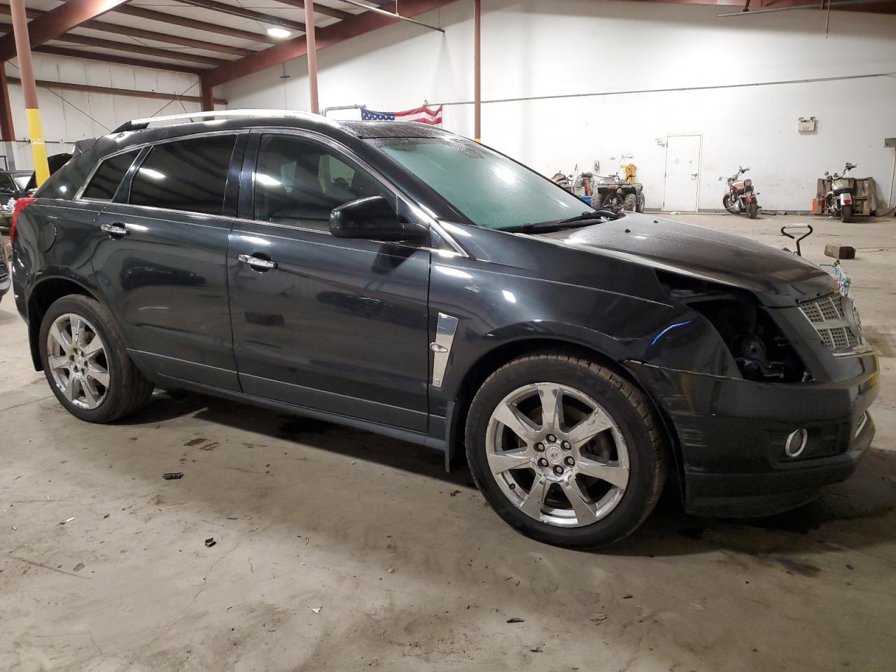 Photo 3 VIN: 3GYFNFE30CS565521 - CADILLAC SRX 