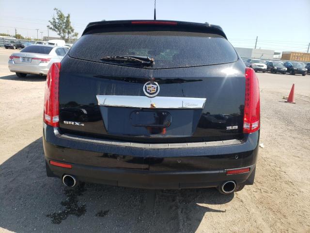 Photo 5 VIN: 3GYFNFE32ES675411 - CADILLAC SRX 