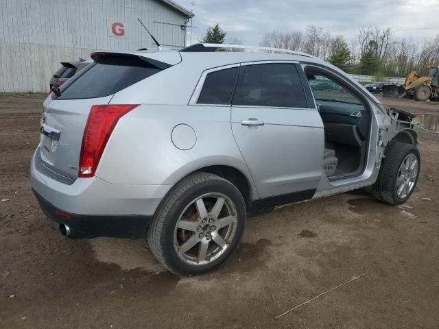 Photo 2 VIN: 3GYFNFE34CS572939 - CADILLAC SRX PREMIU 