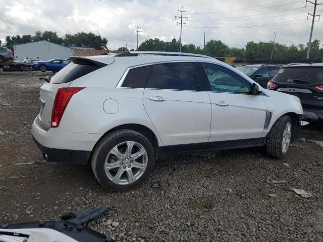 Photo 2 VIN: 3GYFNFE37ES664016 - CADILLAC SRX PERFOR 